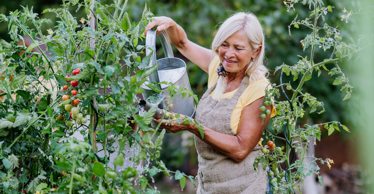 Mature woman watering